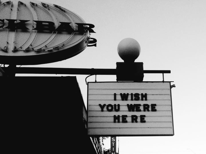 retro marquee sign with the words I Wish You Were Here